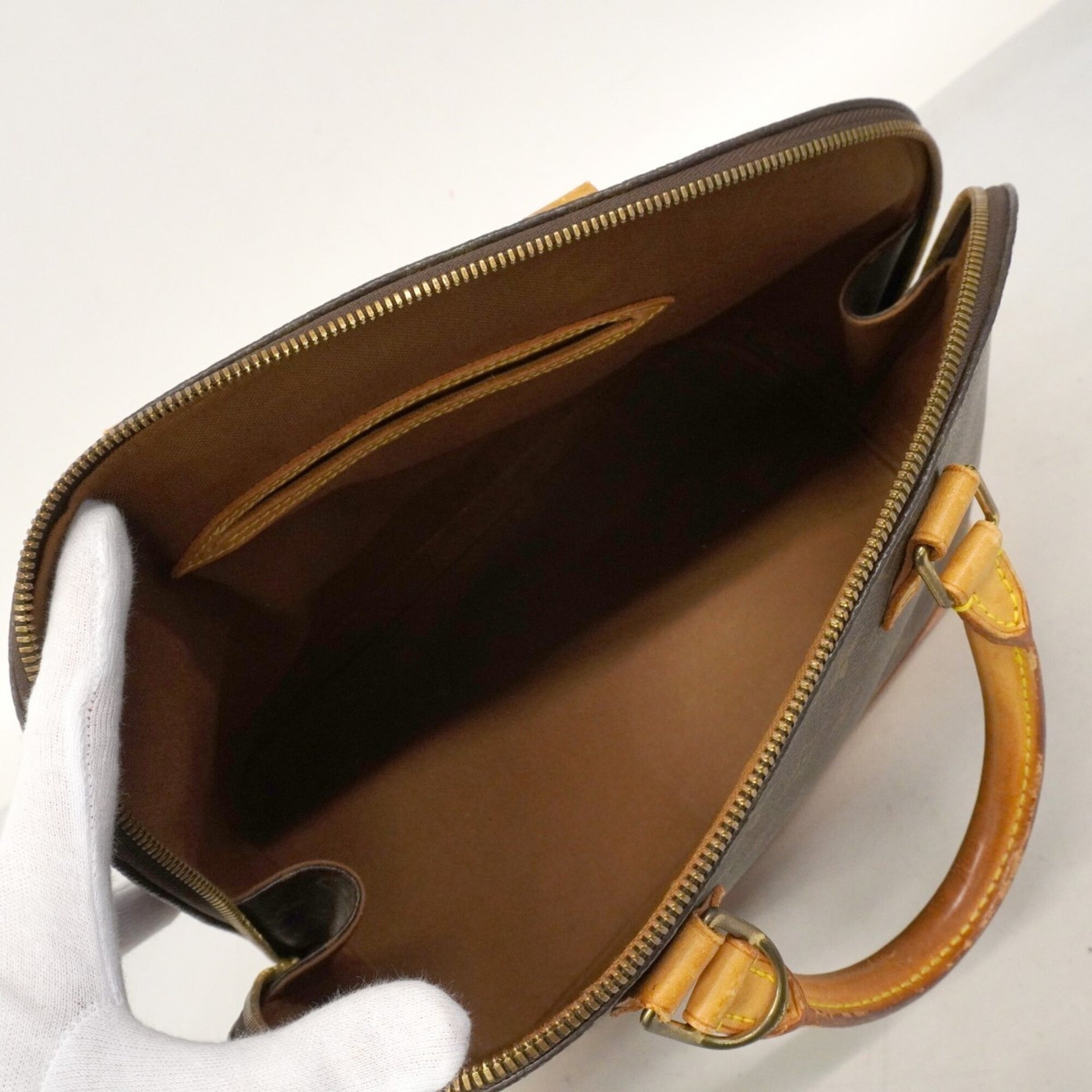 Sac à main Louis Vuitton Alma en toile Monogram M51130 marron pour femme 7