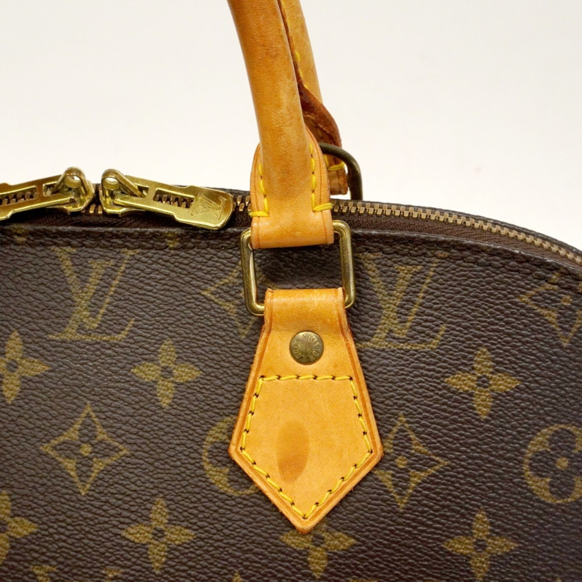 Sac à main Louis Vuitton Alma en toile Monogram M51130 marron pour femme 19